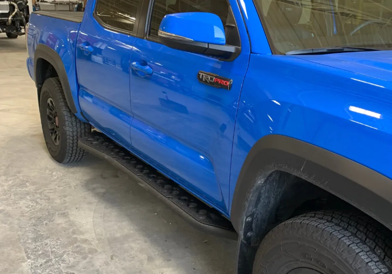 CALI RAISED LED 2005-2022 TOYOTA TACOMA STEP EDITION ROCK SLIDERS