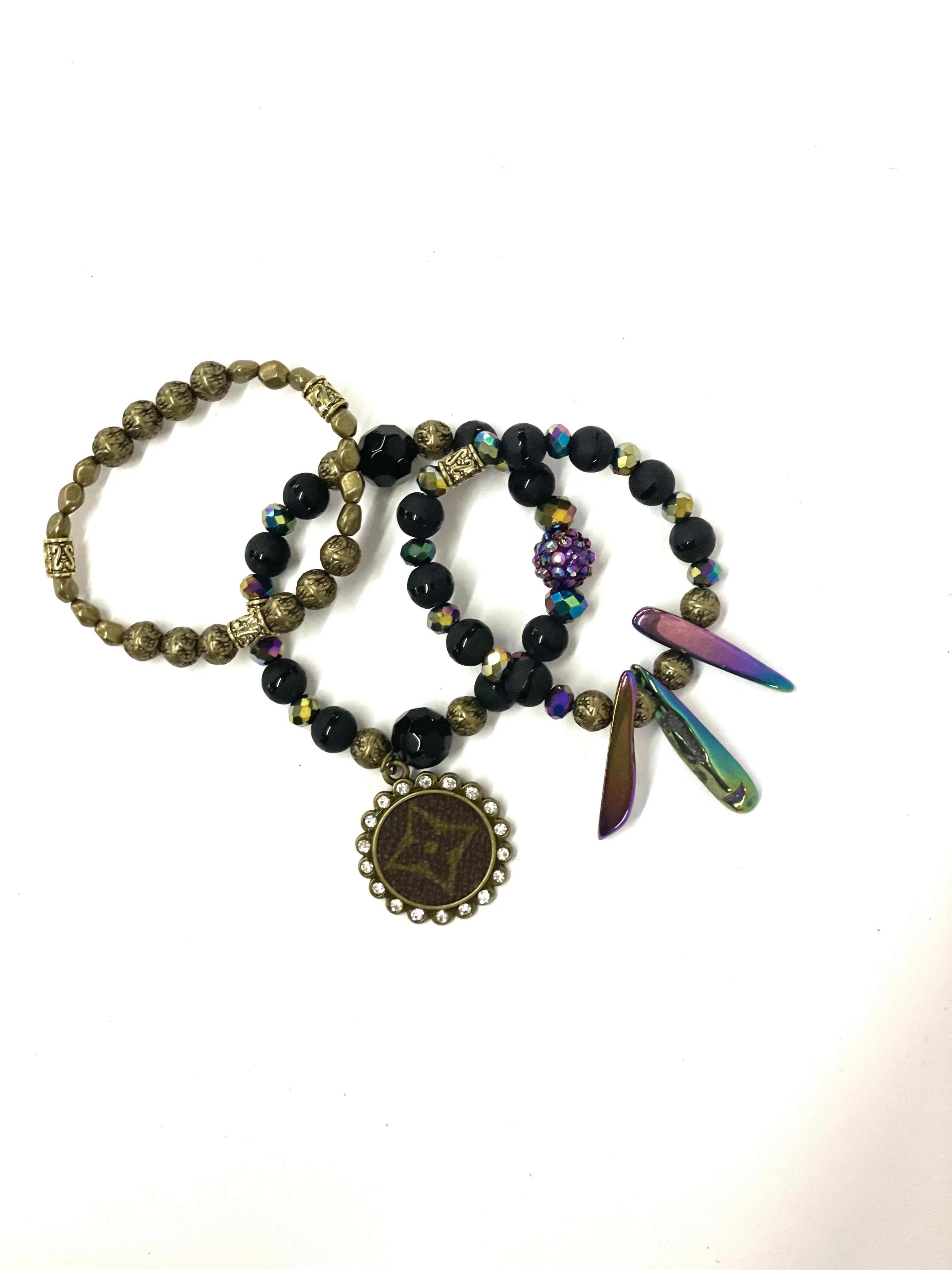 Hand beaded bracelet set black, antique, iridescent beads with antique pendant